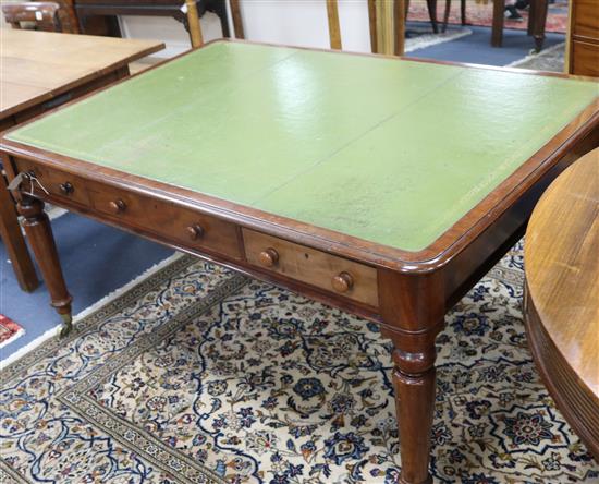 A Victorian mahogany partners writing table, fitted six drawers W.153cm